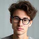 Photo of student Rajesh P. with glasses.